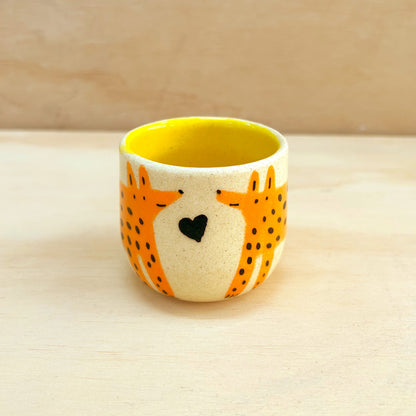 Taza pequeña perro naranja