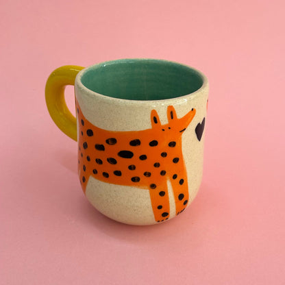 Taza perritos naranjas