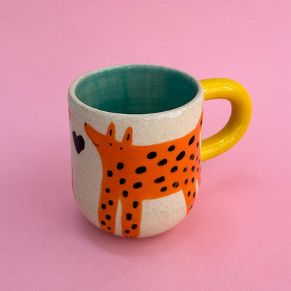 Taza perritos naranjas