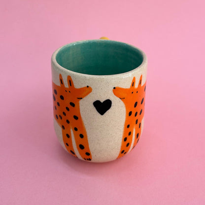 Taza perritos naranjas