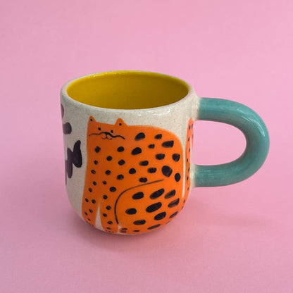 Taza gatos naranjas