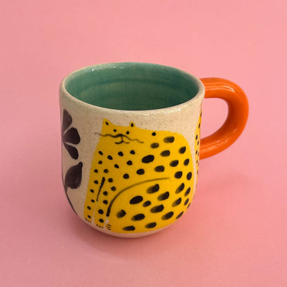 Taza gatos amarillos