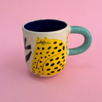 Taza gatos amarillos